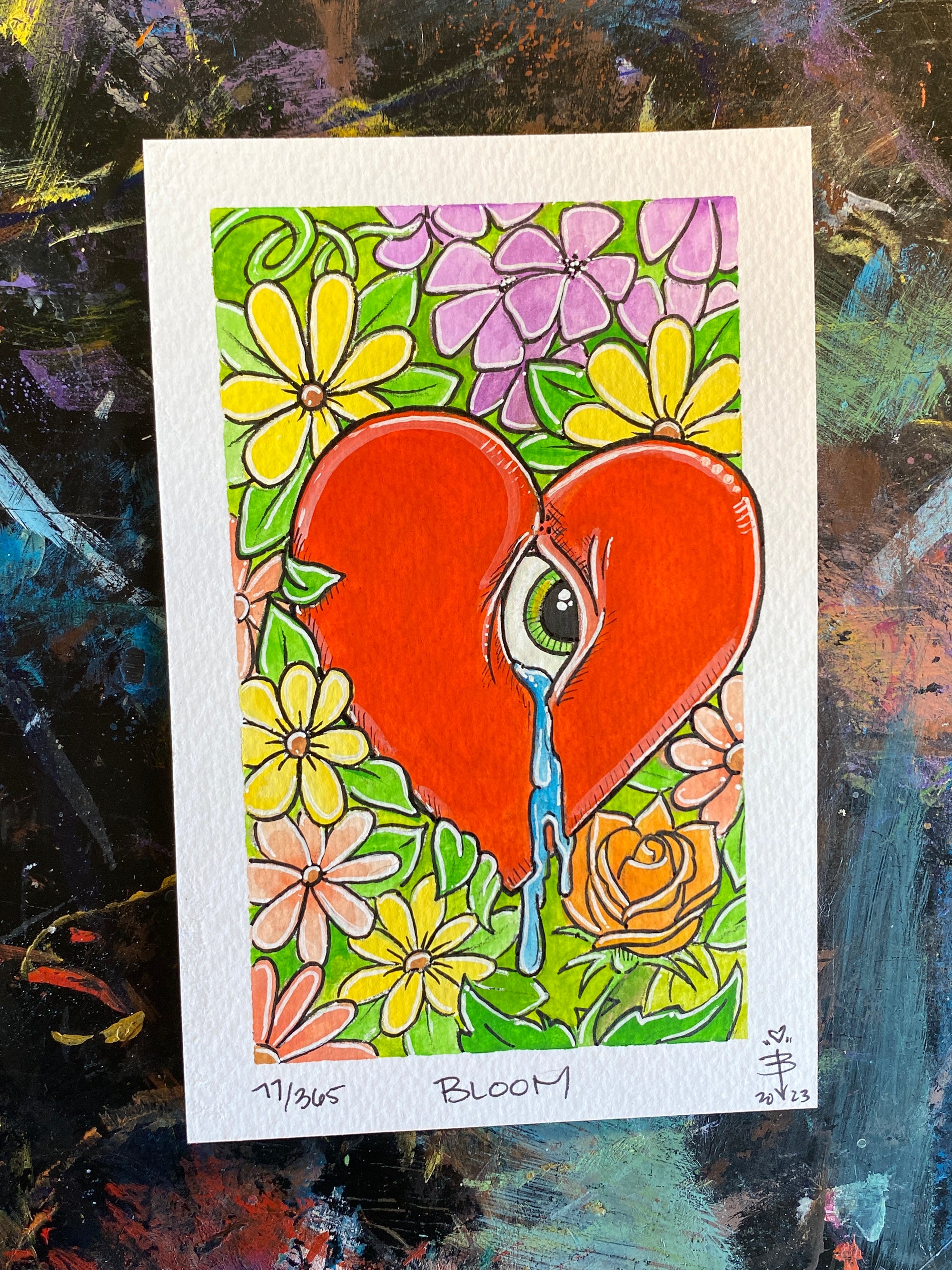 Original illustration by BrittneyMonster, red heart with eye, crying, into a bed of flowers